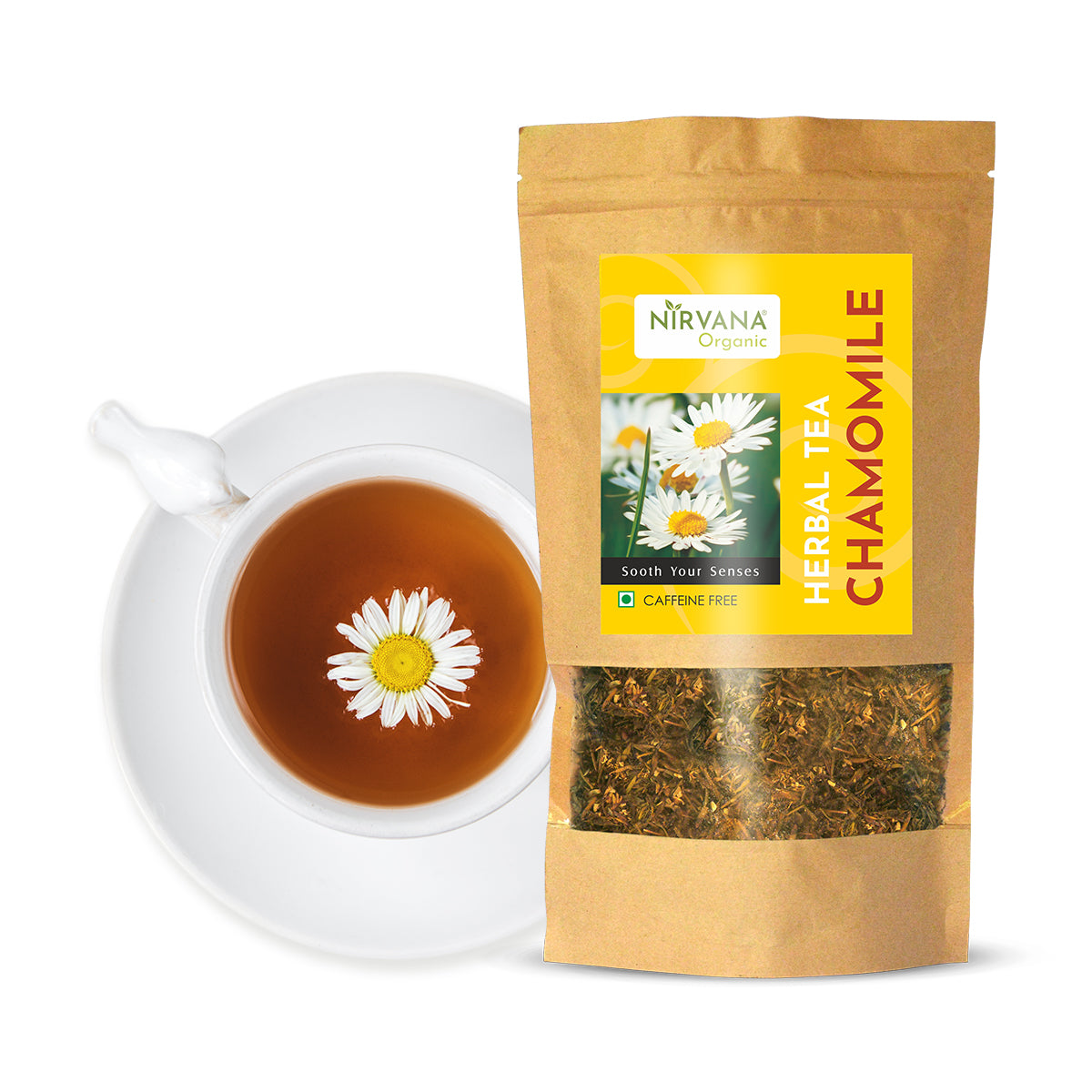 Nirvana Organic chamomile herbal tea package with white tea cup containing golden brewed tea and floating chamomile flower - caffeine-free bedtime tea lifestyle scene